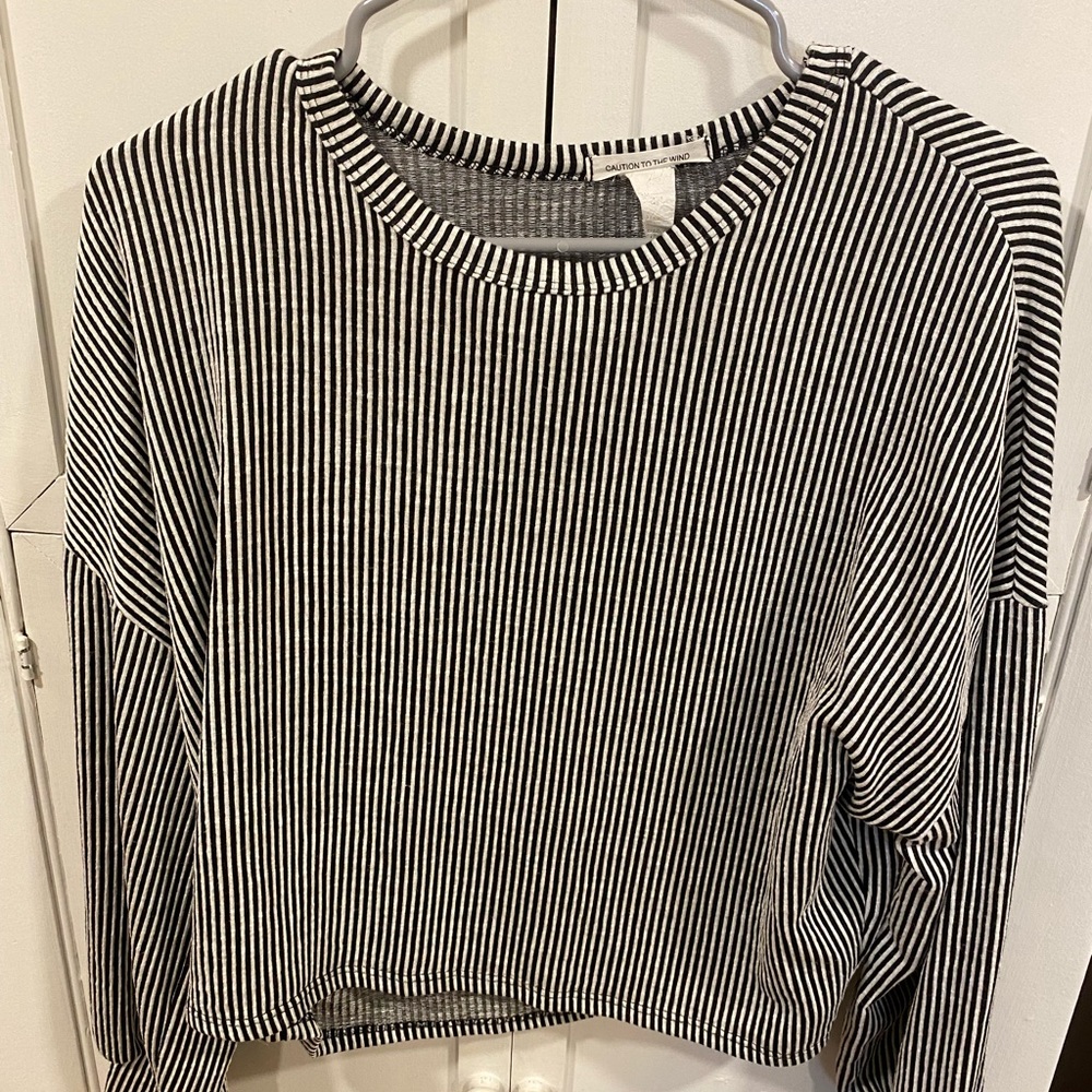 Long sleeve striped shirt.